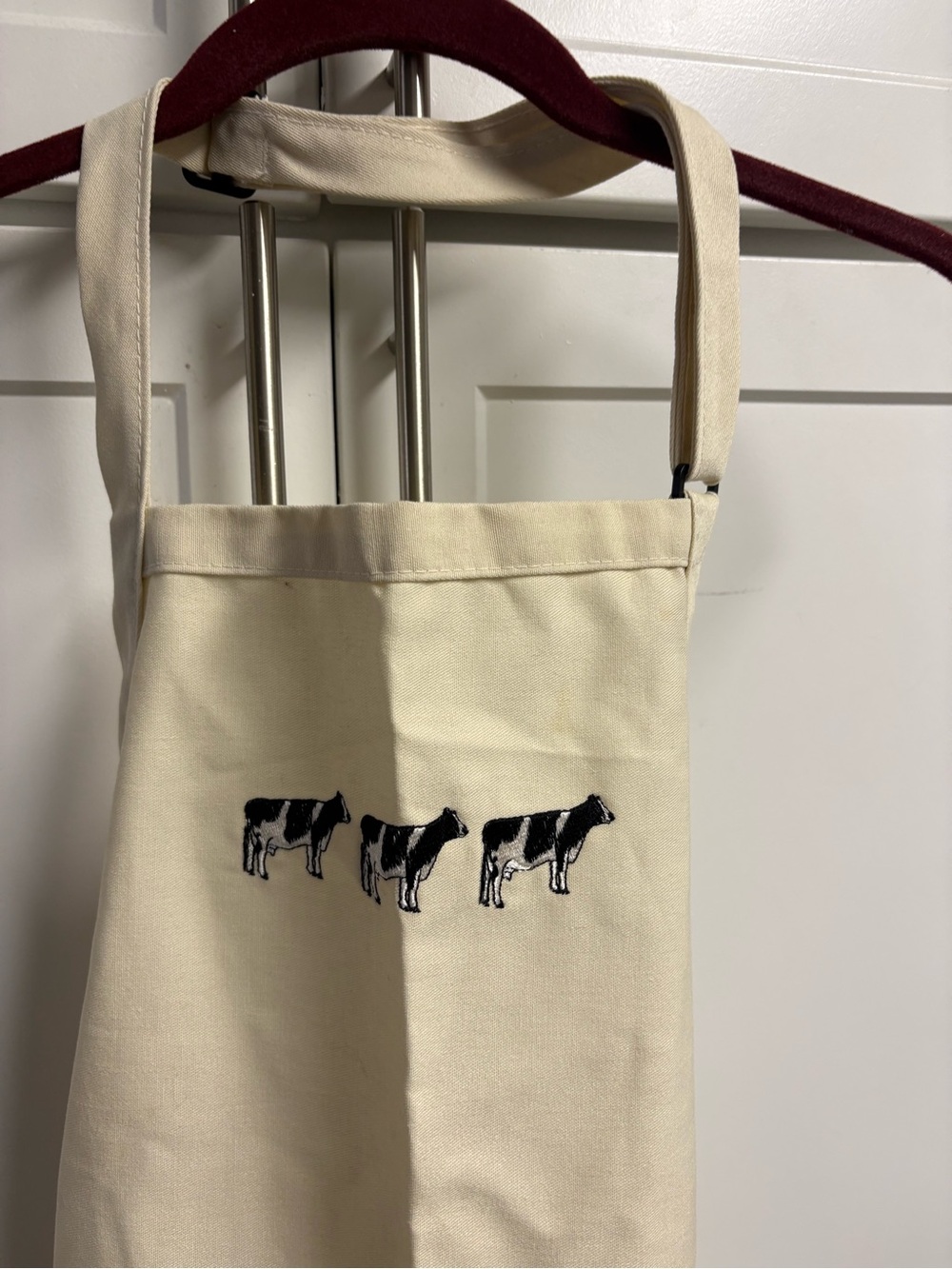 Cream Canvas Apron with 3 Embroidered Cows in a row